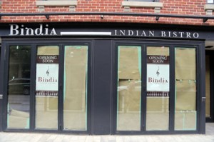 Brown paper and green tape teasingly unfurls to reveal zilch inside